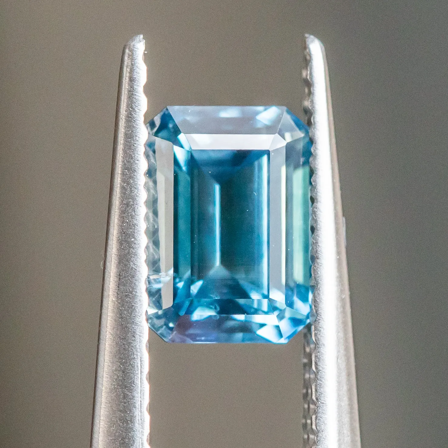 1.36CT EMERALD CUT MONTANA SAPPHIRE, BLUE, 6.6X4.9MM