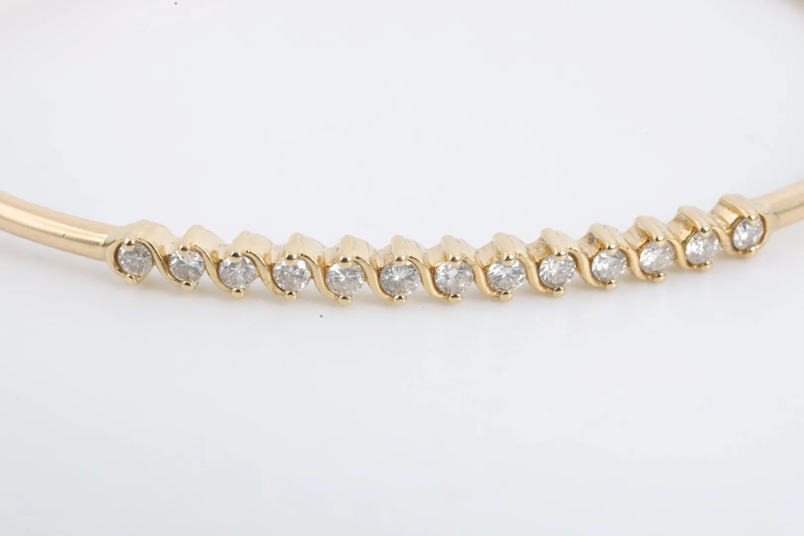 6.5" 14k Yellow Gold 0.52tcw Diamond Bangle Bracelet (6.79g.)