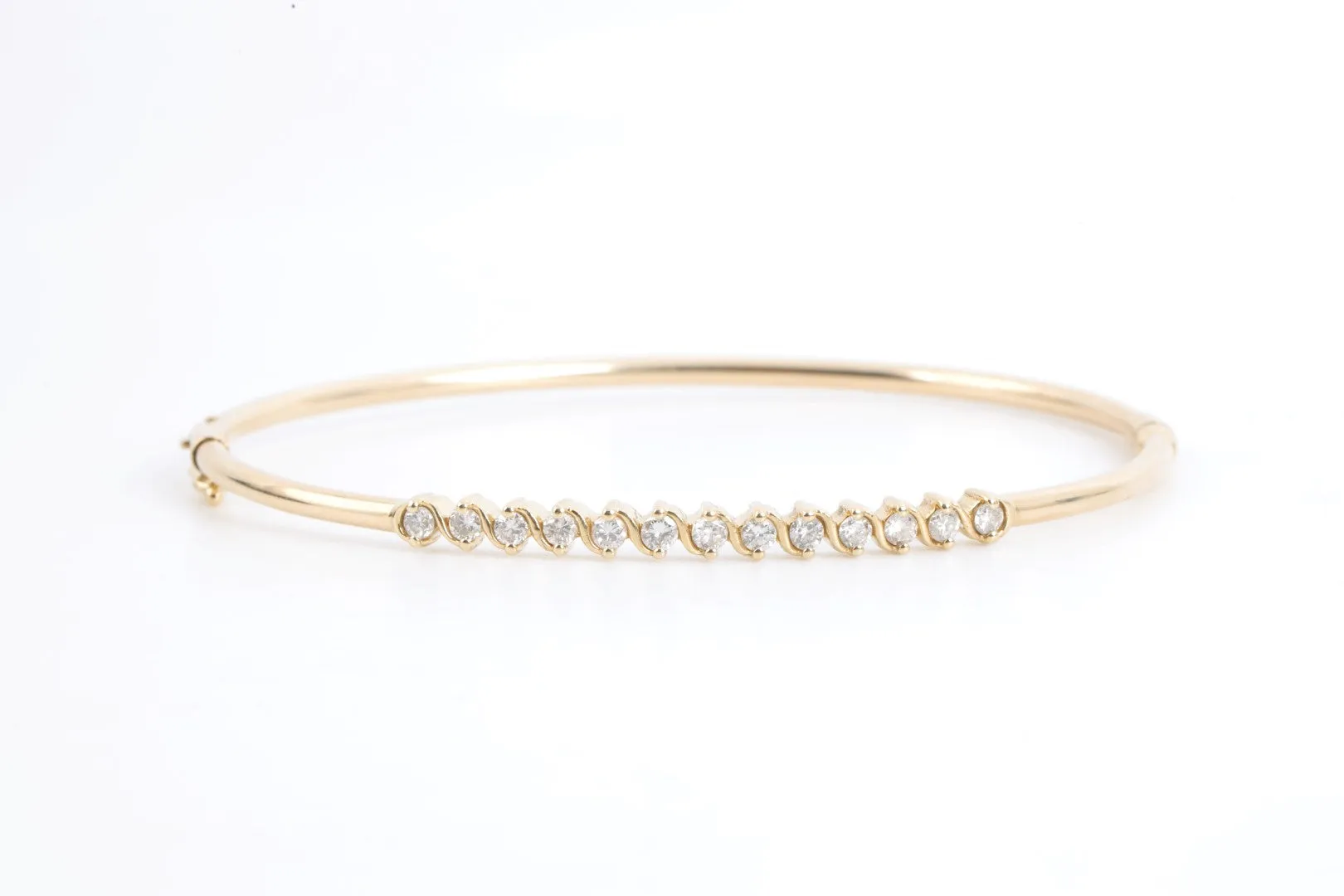 6.5" 14k Yellow Gold 0.52tcw Diamond Bangle Bracelet (6.79g.)