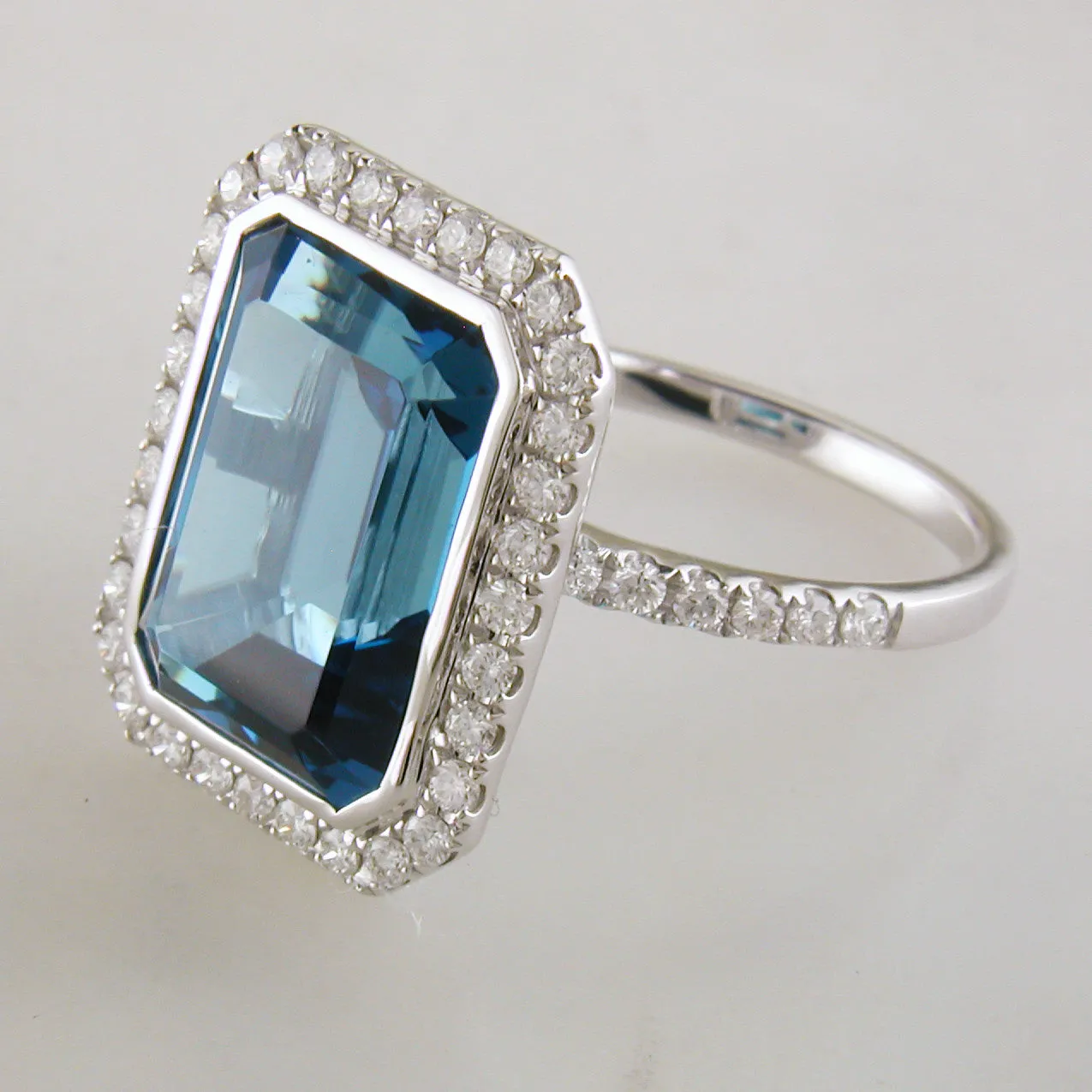 Doves London Blue Rectangle Topaz Diamond Halo 18K White Gold Ring