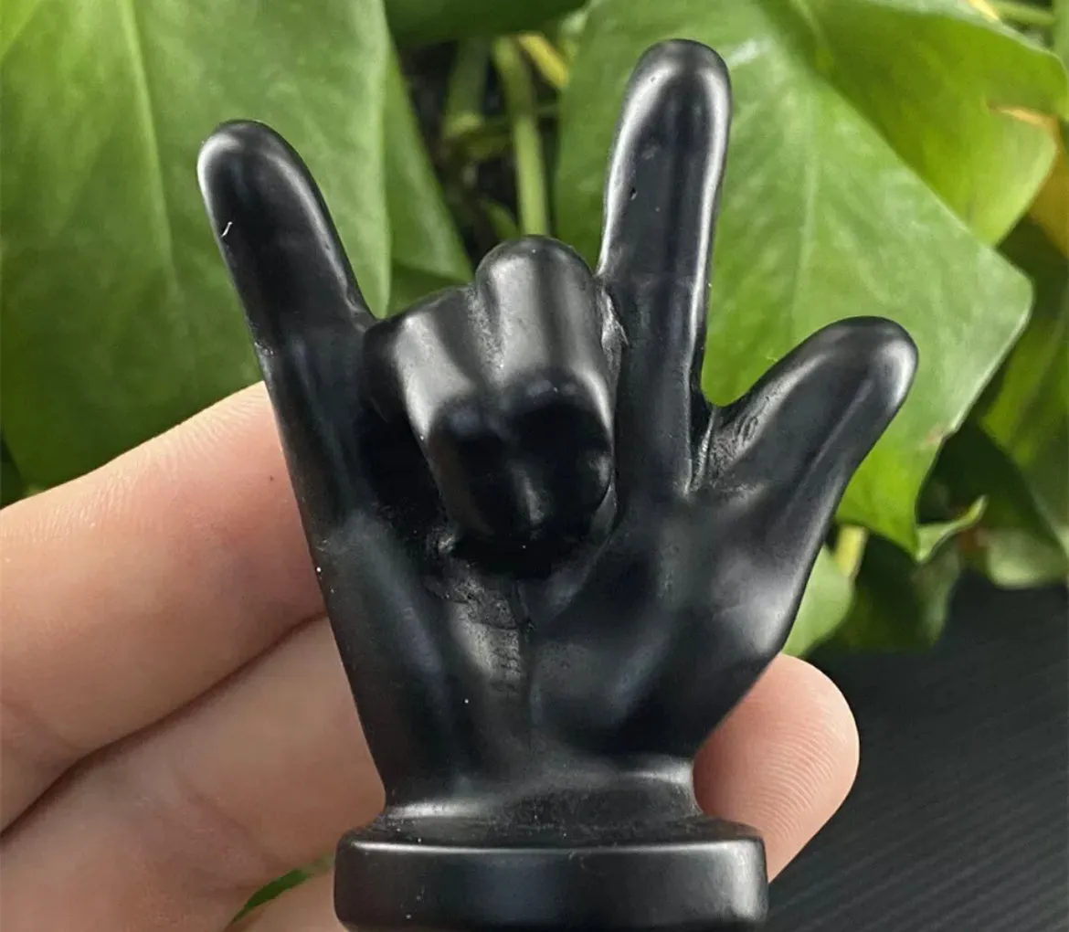 Natural Black Obsidian gemstone carved Rock and Roll Hand