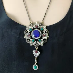 Ornate Gold Pendant Necklace with Blue Red and Green Stones